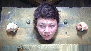 BDSM Sub Dominated In Pillory Before Group