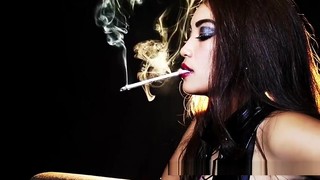Stunning Mia Smoking In Latex