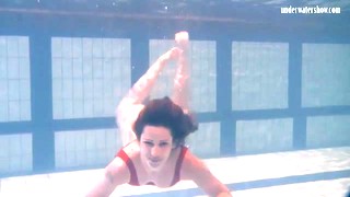 Swimming Brunette In One Piece Swimsuit