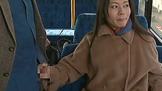 Fancy Cougar Dressed Heavily Giving A Guy Captivating Handjob In The Bus In Reality Shoot