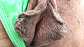 Smiling Japanese Black Head Flashes Her Hairy Pussy For A Fingerfuck
