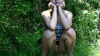 Spy Video Featuring Sweet Looking Chick Nelly Is Pissing In The Bushes