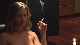 Sexy Blonde Grabs A Smoke While She's Posing And Showing Ni