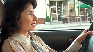 Horny Brunette Woman In The Car