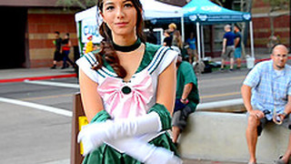 Beautiful Girl Melody Wears A Costume While She Walks Outdoors
