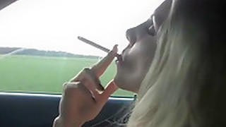 Danni Smoking In Her Car